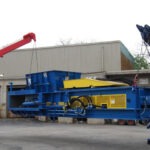 Hauling-a-Two-Ram-Baler-for-installation-1