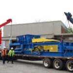 Hauling-a-Two-Ram-Baler-for-installation-2